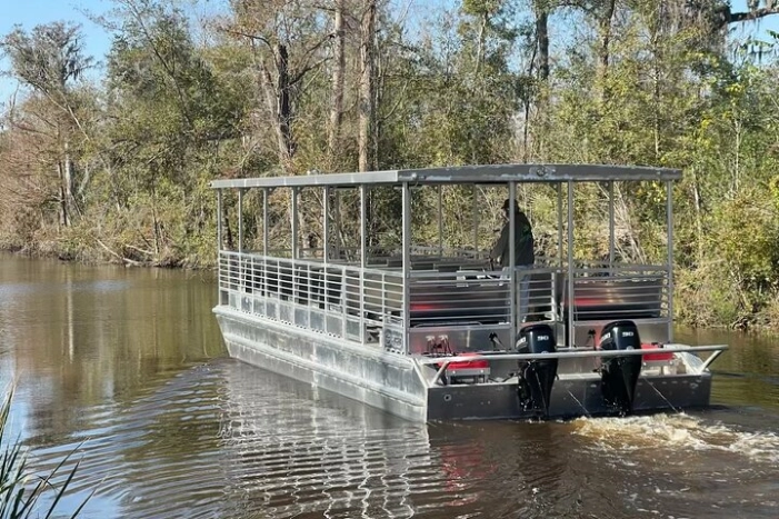 Covered Boat Swamp Tour with Transportation from New Orleans