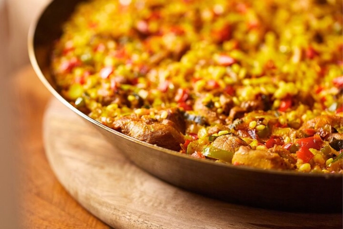 Cook Authentic Spanish Paella With Classpop! in Denver